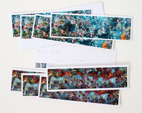10 extra wide postcards with matching envelops